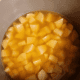 Place potatoes and chicken broth in same pot. Make sure chicken broth fully covers potatoes. Boil.