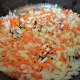 Saute the onion, carrot, and garlic.