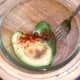 Seasoned avocado ready for mashing
