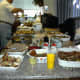 10. Later on he took a pretty good sampling from the buffet laid out for the families to strengthen them during and after their work.