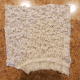 Cut a rectangular shape out of your old sweater.