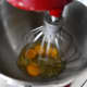 Beat the four eggs in your standing mixer. The medium setting (5 or 6) is suggested.