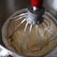 Pour your hot liquid mixture into your standing mixer. Beat for about 15-20 seconds. Turn off. Scrape down the sides of the bowl. Beat on the lowest setting again for about 10 seconds. Your batter should be smooth.