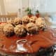 Decorate the cake with the toppings of your choice. I started by placing Ferrero Rocher chocolates on top.