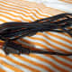 AC cord used in conjunction with an AC adapter