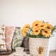Add to tables: yellow flowers in vases, coffee cups, and books. You want simple yet satisfying accents.