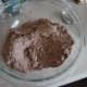 When you add water, add it in increments. Tepid water is suggested. If your dough is stiff, add more water.