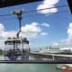 The Ngong Ping Cable Car is a 5.7-kilometer (3.5-mile) long bi-cable gondola lift system (referred to by its operators as a "cable car".