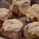To keep your cinnamon rolls warm and fresh, just put them in the oven with the oven light on. It'll keep them warm, and the glaze will melt a little... which is perfect.