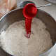 Preheat the oven to 350&deg;F. Grease a 9x13 pan. Sift together the flour, baking powder, and baking soda. Set aside.