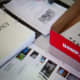 Use tools like files, folders, boxes, trays, baskets etc to help organize tasks for your child.