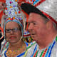 Local people in all their finery show off their extravagant costumes before they begin the parade along the streets
