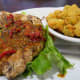 Grilled chicken breast topped with sundried tomato pesto and a side of fried okra