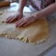 Mash the dough with your hands and knead it. Make sure it has the right consistency, not too wet or too dry.