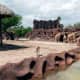 Gazelles and giraffes on a moat-protected island at the Gladys Porter Zoo in Brownsville, Texas