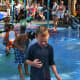 The author's son gets wet on the Swabbie's deck splash pad.