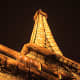 Photographs of Subjects from Around the World. The famous Eiffel Tower, illuminated at night, Paris, France