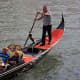 Modes of Transportation from Around the World. A gondolier gently negotiates the canals of Venice in Italy