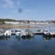 Small boats moored at Port Ellen Harbour