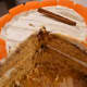Here you can see the slight orange hue of the cut cake. Without the food coloring, the cake looks more whitish-yellow. 