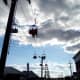 A sky ride (ski lift) ride at a fair.