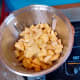 Potatoes and chicken broth have been added