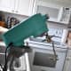 The dough hook is easy to attach to the stand mixer. I find it easiest to tilt the head back and then attach the hook.
