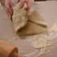 Fold the shorter sides of the dough into the middle.