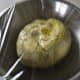 Place the dough in the oiled bowl. Turn it on its sides to spread the oil. Cover it with plastic. Let it rise for five hours. It should double in size and/or spring back slowly when you touch it.