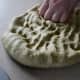 The dough should be easy to manage. Your dough shouldn't be soggy or too dry. The dough should be soft, smooth, and elastic.