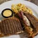 808 on Main: The Kimchi Reuben on rye with a side of dipping sauce and spicy pasta salad is definitely a local favorite.