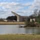 Side view of the Performing Arts Pavilion from across a waterway