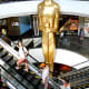 A giant golden Oscar statue stands over the escalator to the Hollywood Floor where the 8 screen SF Cinema City is to be found