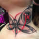 New school butterfly tattoo on neck