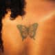 Butterfly tattoo on chest