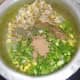 Add chopped spring onion, chaat masala, roasted dried fenugreek leaves, garam masala, cumin powder and green chilli sauce.