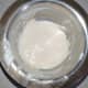 Make a flour paste to seal the samosas by mixing some wheat flour and water.