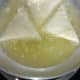 Heat the oil and drop in the samosas.