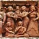 Sacred thread wearing Narayana carrying Parvati during her wedding with Shiva; terracotta. At Sridhar temple in Sonamukhi, Bankura.