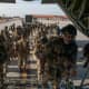 On February 23, 2022, US paratroopers from the 2nd Battalion, 503rd Infantry Regiment depart Italy's Aviano Air Base for Latvia. Thousands of US troops have been deployed to Eastern Europe in response to Russia's military buildup.