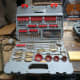 My drill bit accessories box containing the guage plate