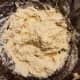 Slowly stir water into your mix. Dough should look like this.