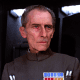 Peter Cushing as Grand Moff Tarkin in Star Wars. His image was used to reprise the Moff Tarken character in Rogue One
