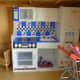 Melissa and Doug kitchen in the play house