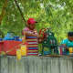 Local entrepeneurship......these people were stood on a path outside the zoo, making fresh fruit juice to order then passing it over the wall.