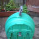 The back of the Hozelock hose reel, showing the slots which slide onto the wall mountings (not shown)