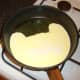 Cream is combined with chicken broth