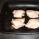 Chicken thighs ready for roasting