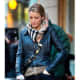 Blake Lively looks sleek in a motorcycle jacket layered with a Burberry scarf.