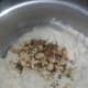 Add the tempering to the batter.